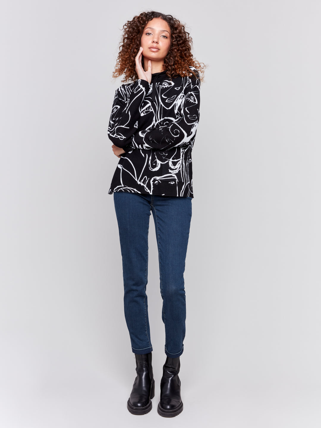 Faces Print Funnel Neck Sweater