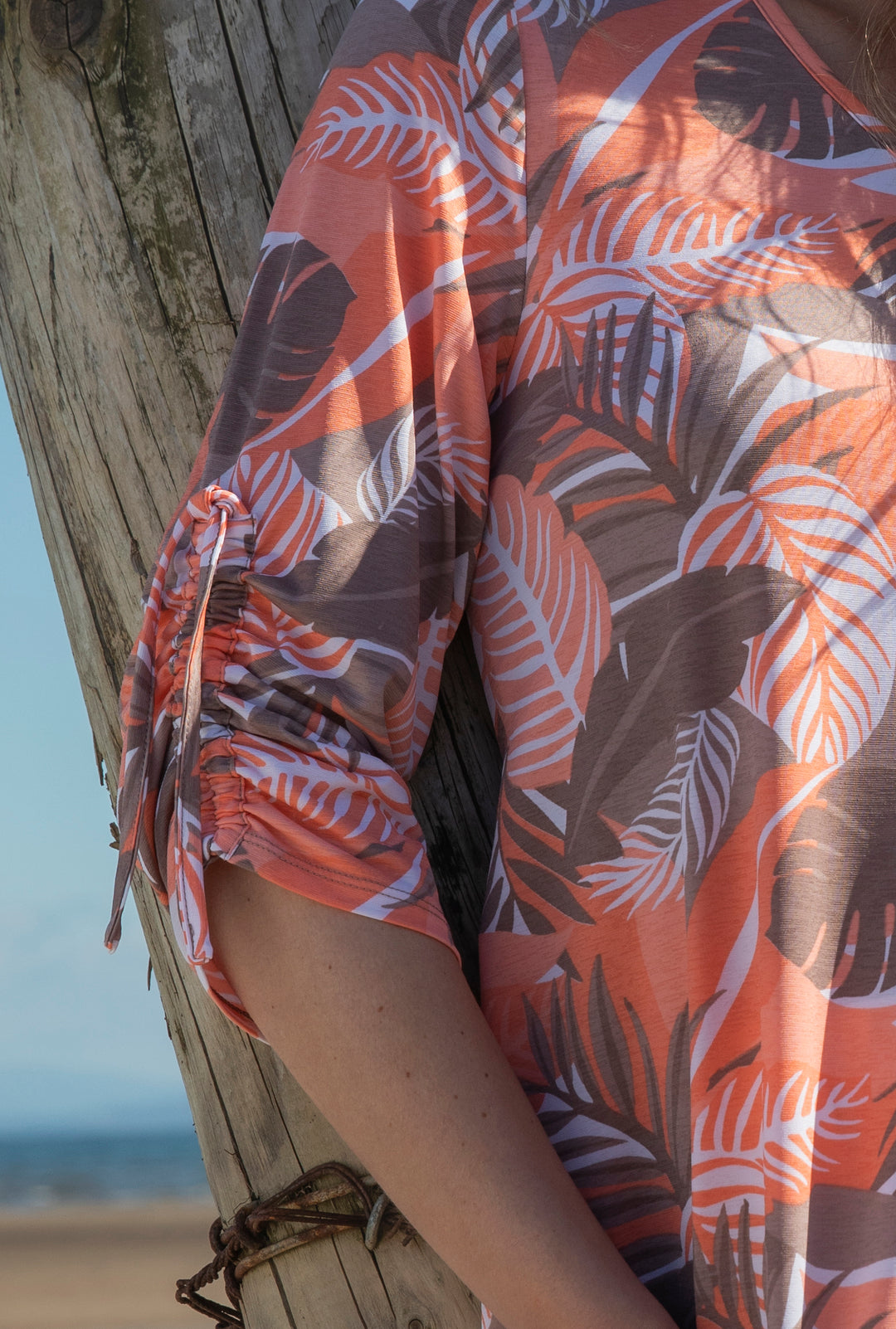 Taupe and Orange Leaf Print Asymmetrical Top